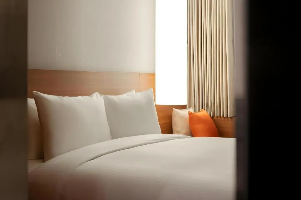 Bed in Top Cloud Hotel Iksan