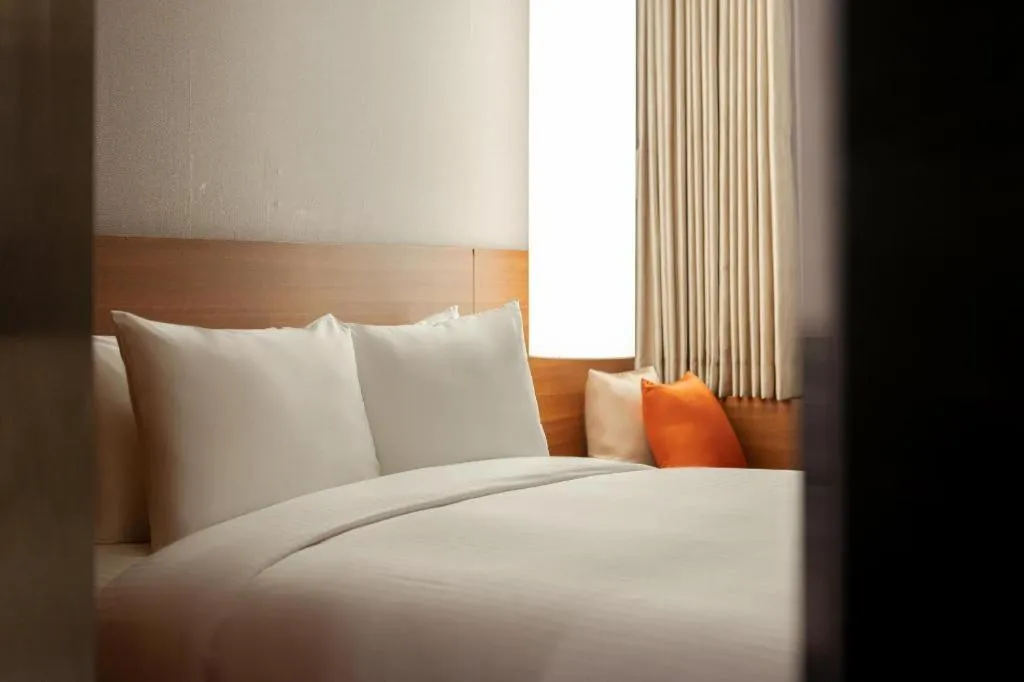 Bed in Top Cloud Hotel Iksan