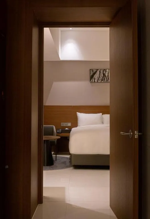 Bed in Top Cloud Hotel Iksan