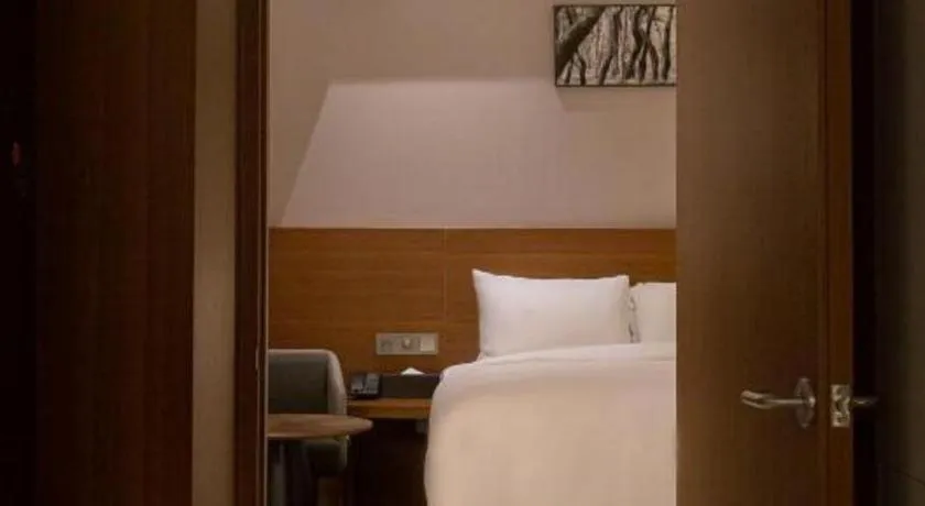 Bed in Top Cloud Hotel Iksan