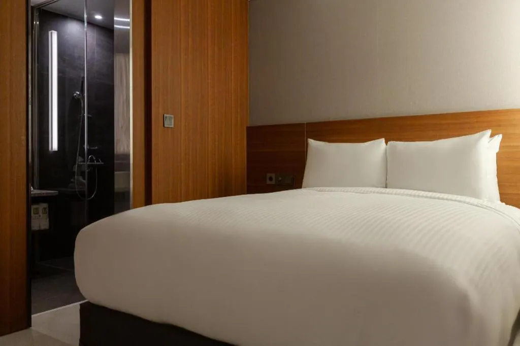 Bed in Top Cloud Hotel Iksan