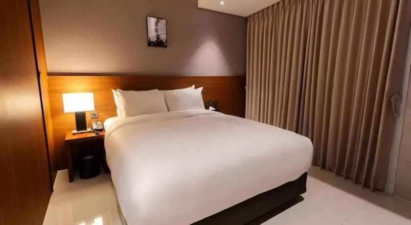 Bed in Top Cloud Hotel Iksan