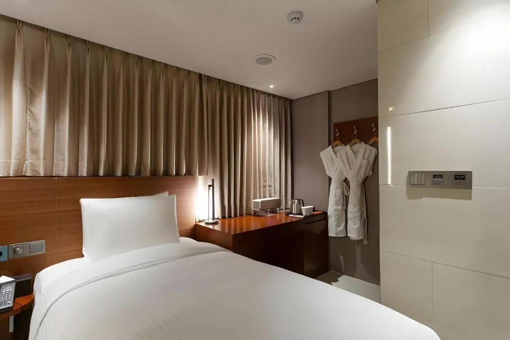 Bed in Top Cloud Hotel Iksan