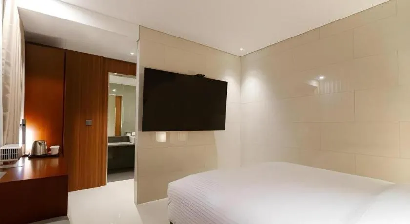Bed in Top Cloud Hotel Iksan