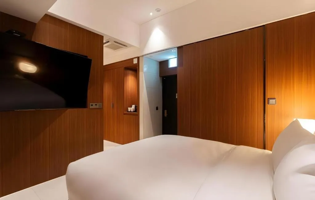 Bed in Top Cloud Hotel Iksan
