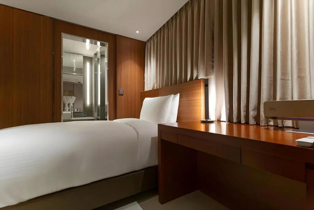 Bed in Top Cloud Hotel Iksan
