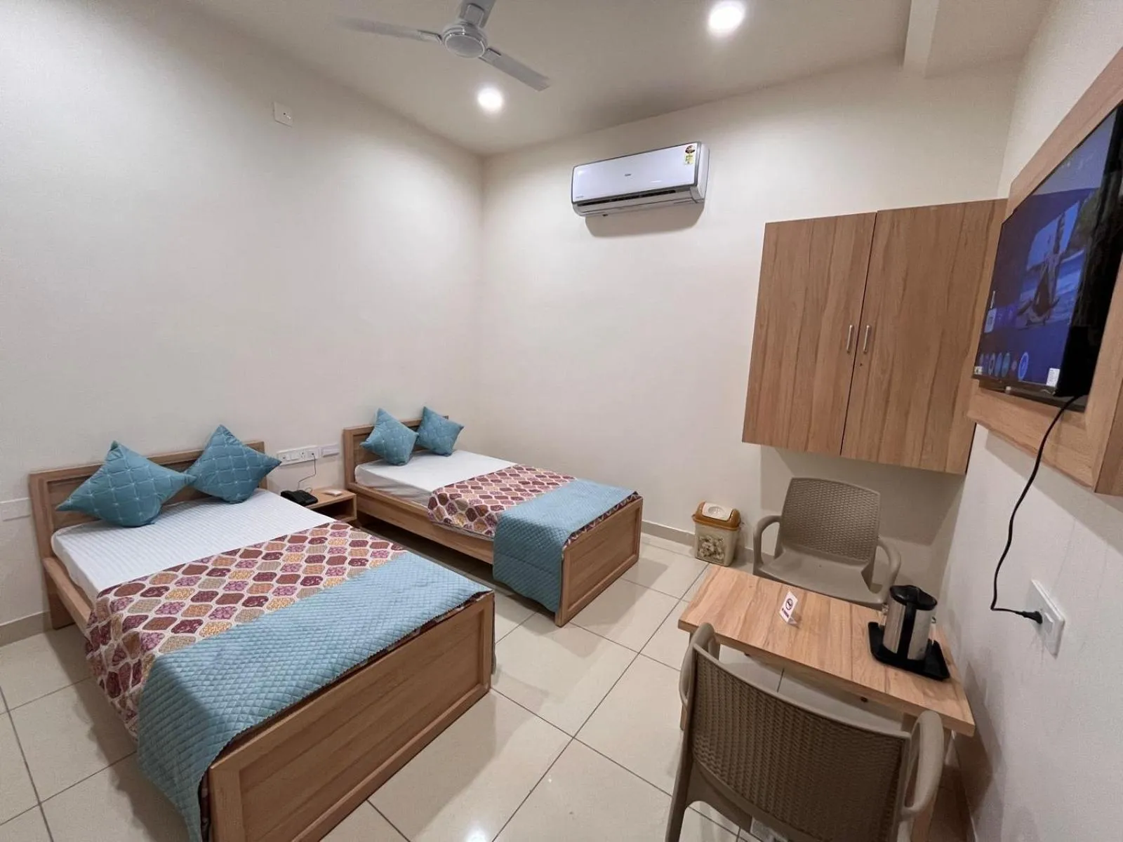 Living room, Bed in Hotel Rajvi Residency A Unit Of Jas Hotels And Resorts