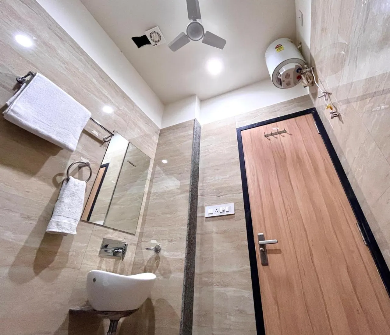 Bathroom in Hotel Rajvi Residency A Unit Of Jas Hotels And Resorts