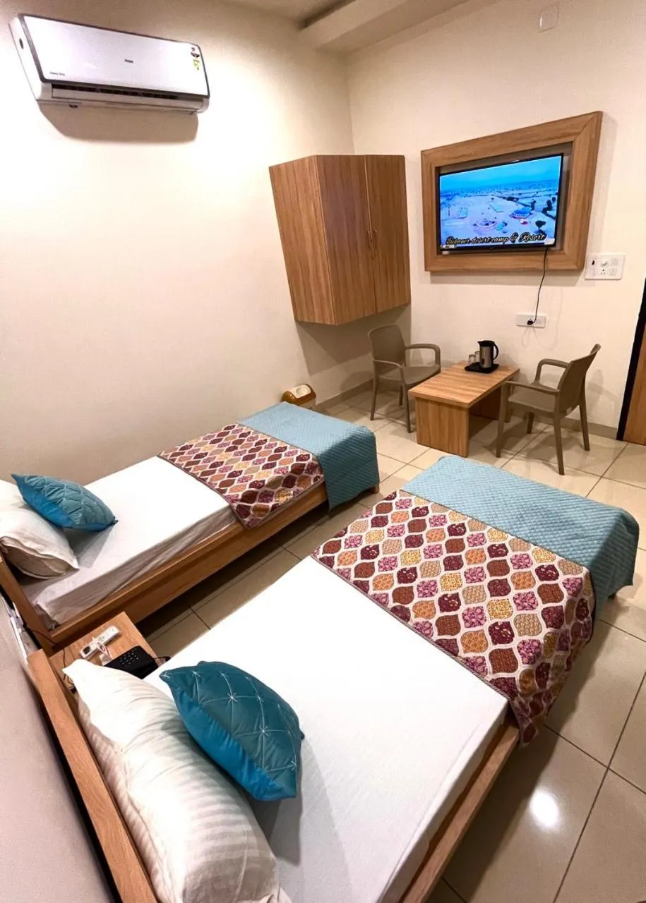 Bed in Hotel Rajvi Residency A Unit Of Jas Hotels And Resorts