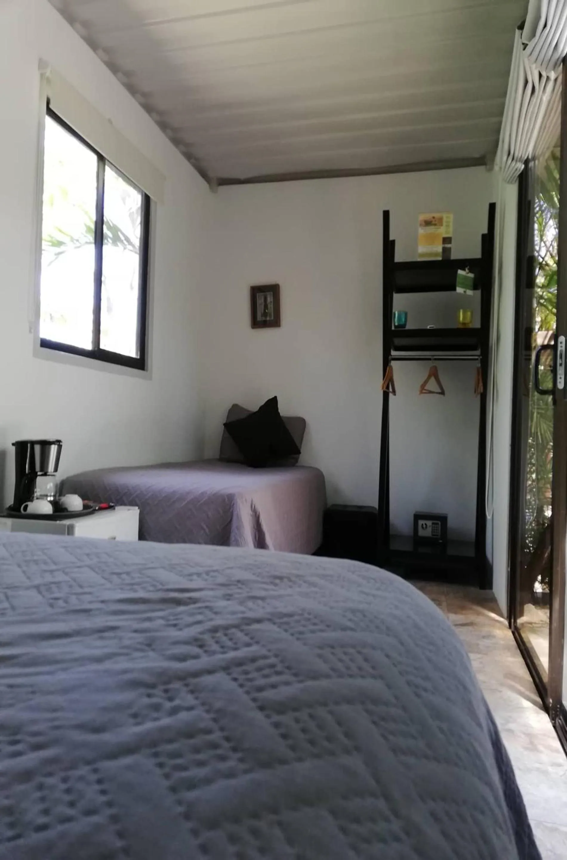 Coffee/tea facilities, Bed in Green Sanctuary Hotel