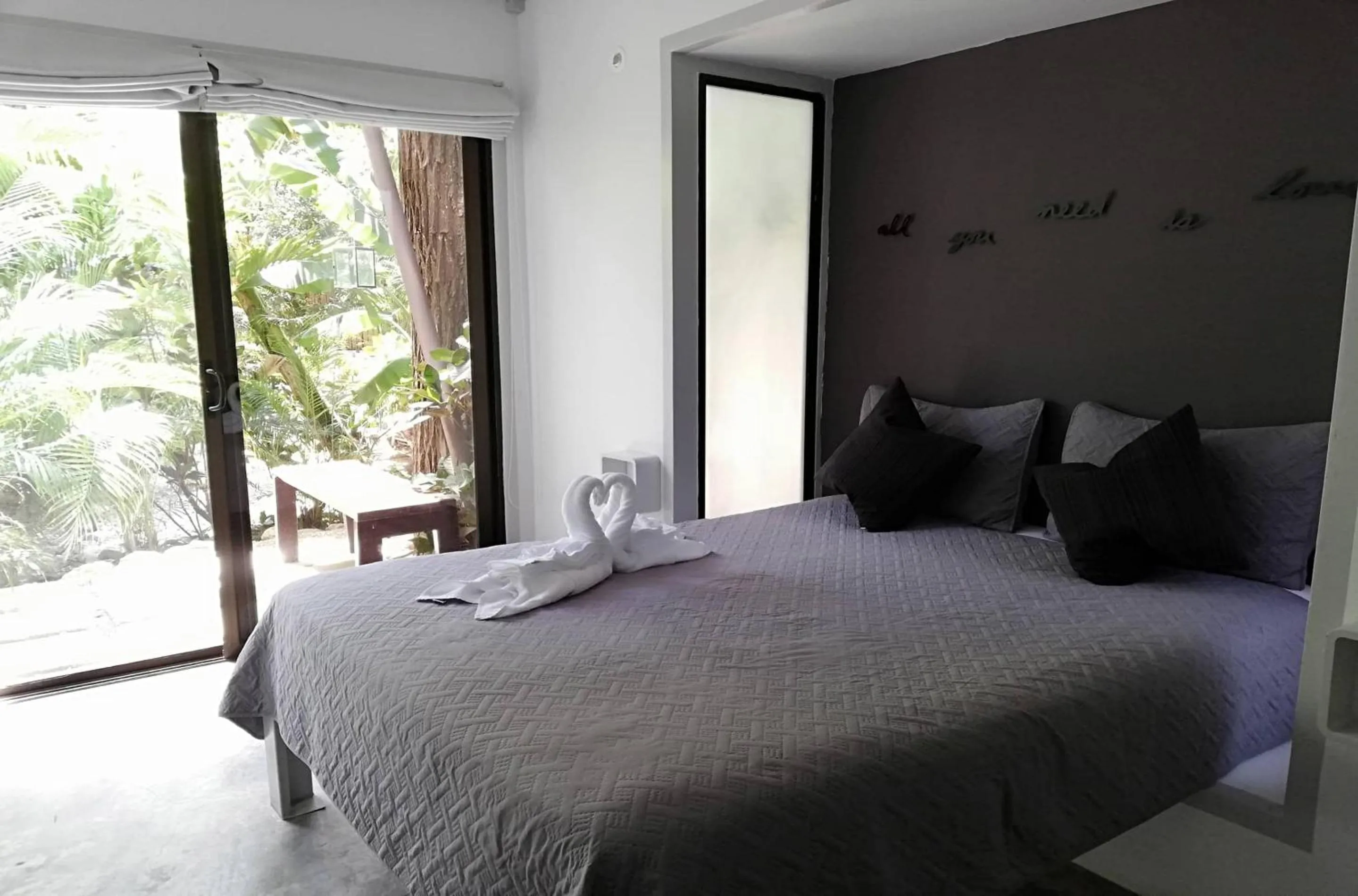 Balcony/Terrace, Bed in Green Sanctuary Hotel