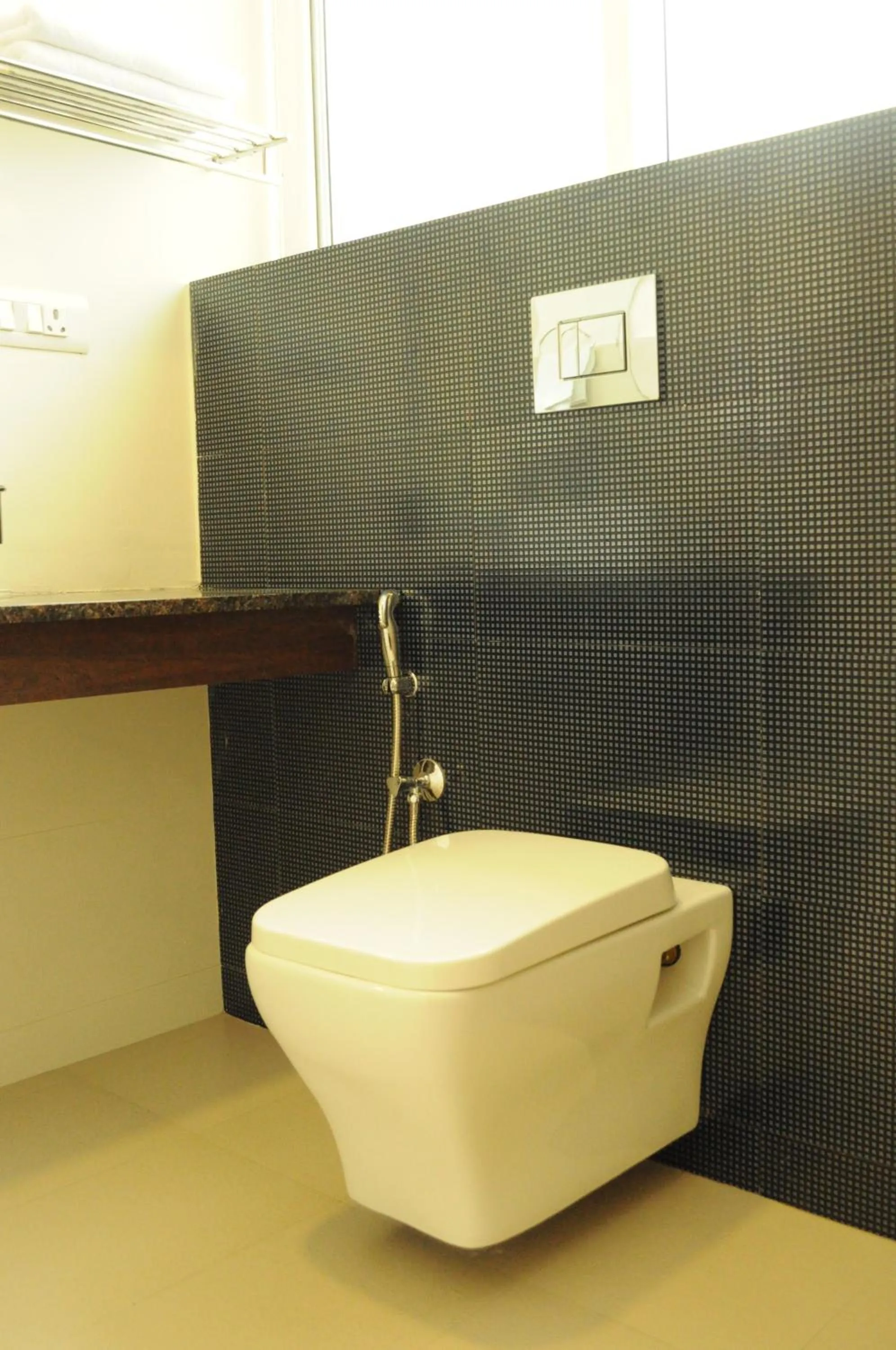 Toilet in Ixora Suites
