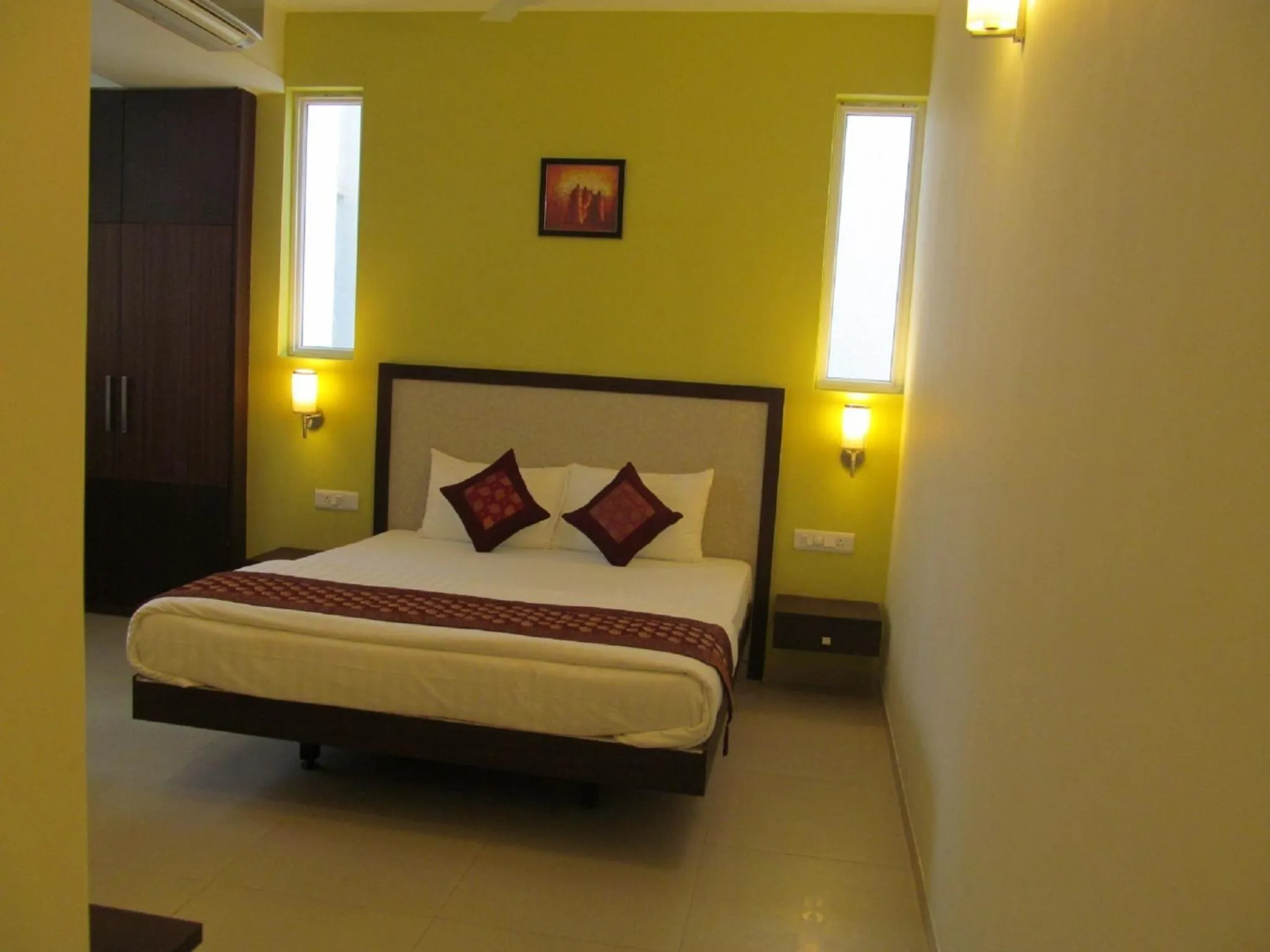 Bed in Ixora Suites
