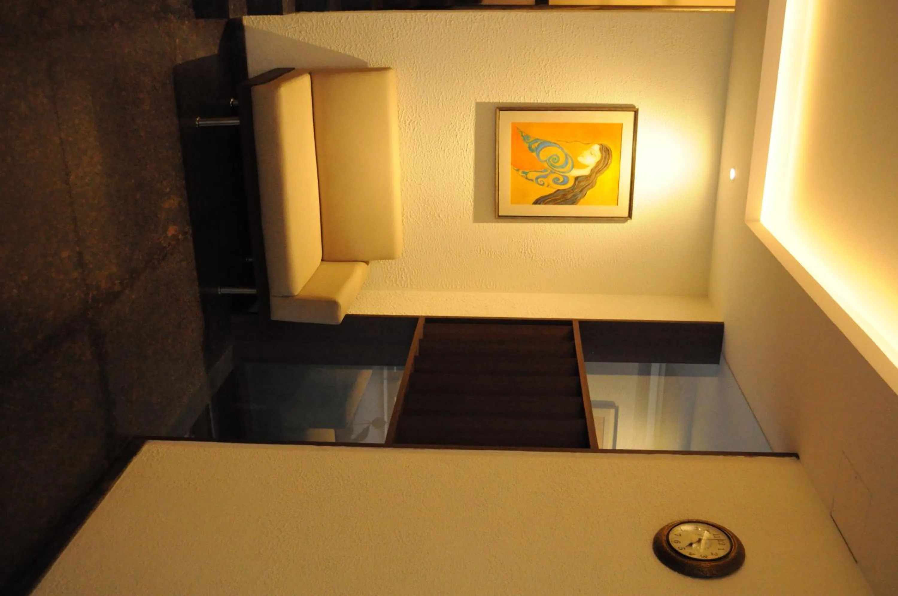 Communal lounge/ TV room in Ixora Suites