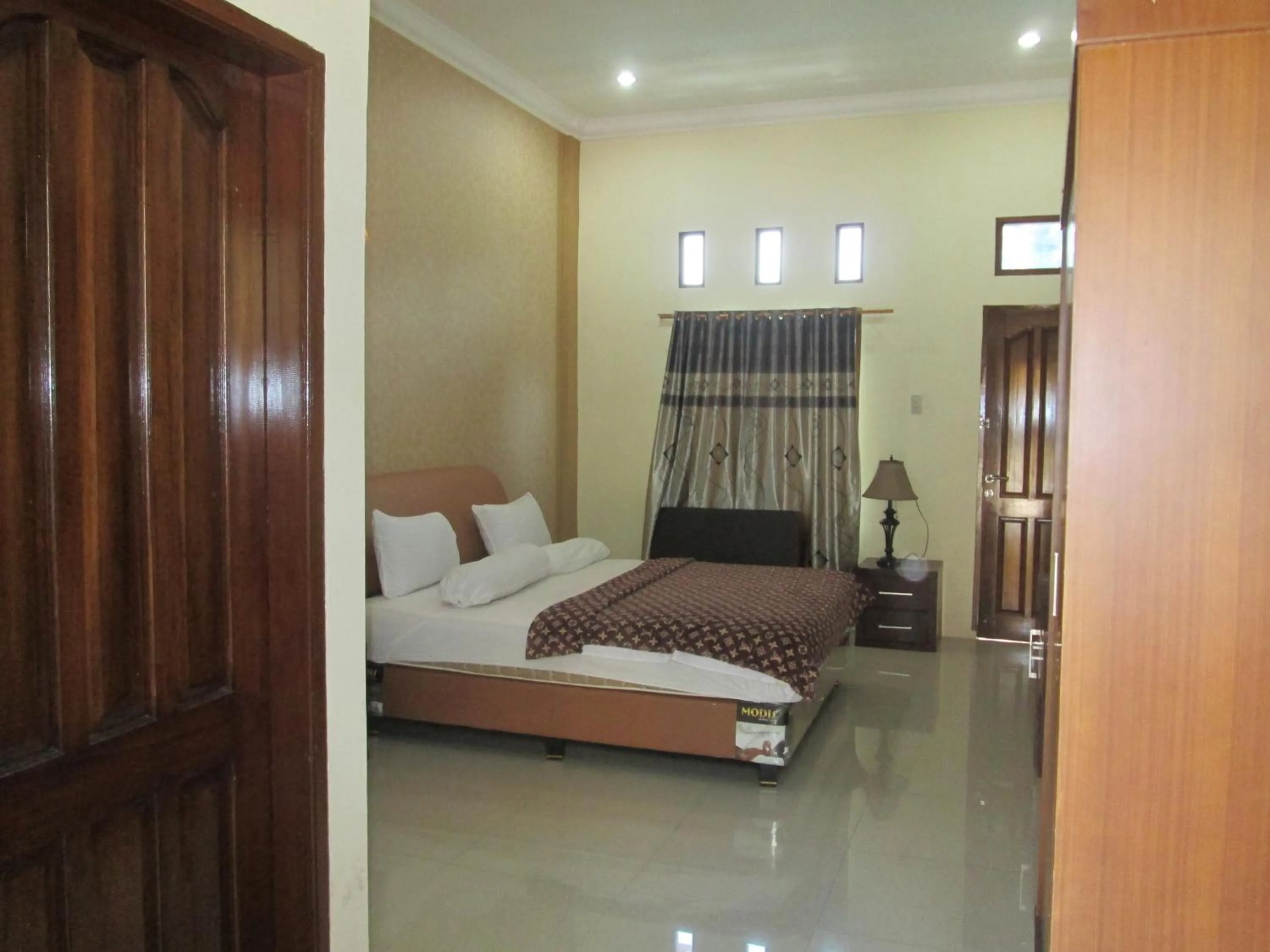 Bed in Permata Land Hotel & Resort