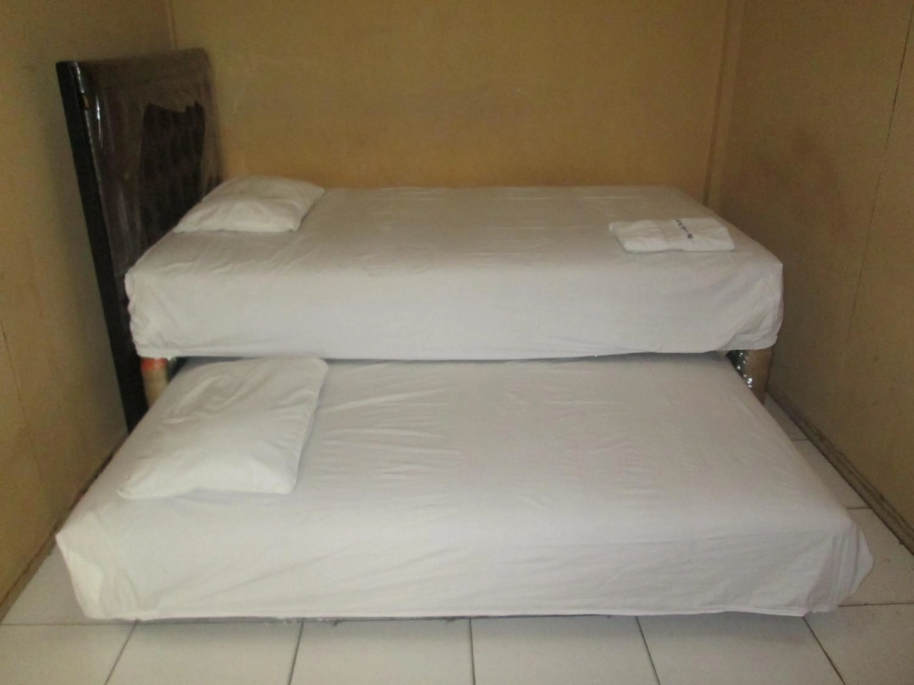 bunk bed, Bed in Permata Land Hotel & Resort