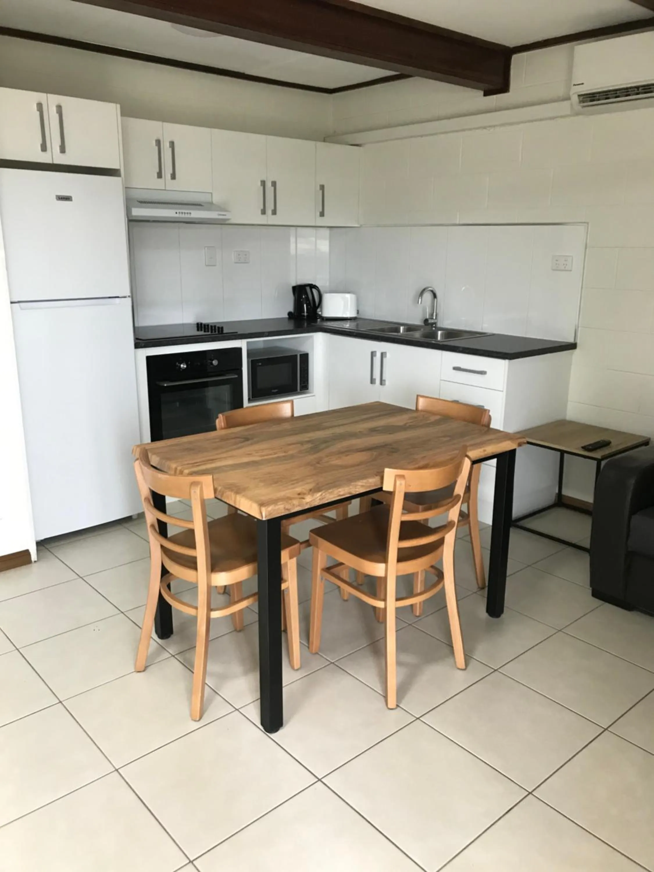 Kitchen or kitchenette in Ocean Breeze Units