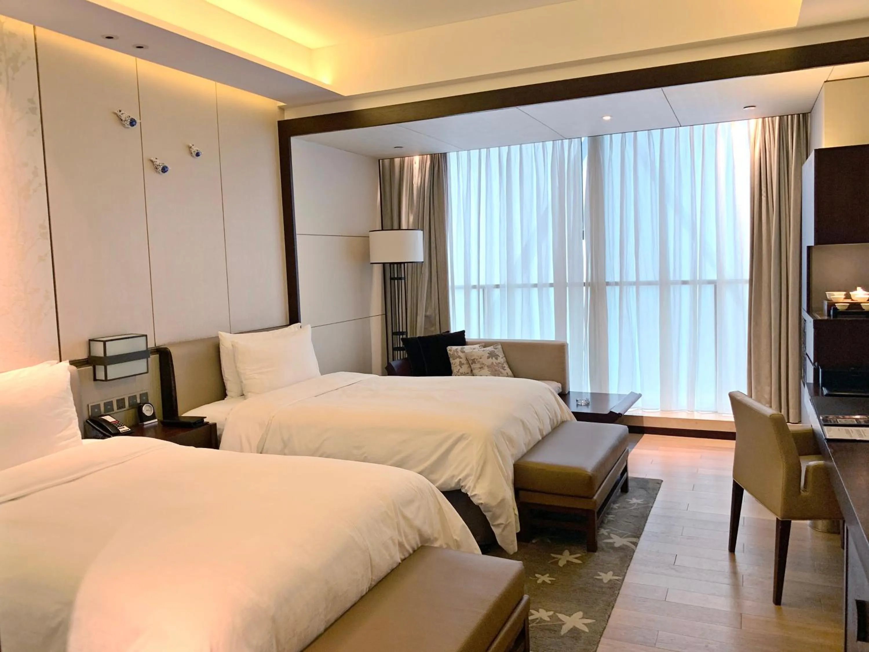 Photo of the whole room, Bed in HUALUXE Hotels & Resorts Nanchang High-Tech Zone, an IHG Hotel