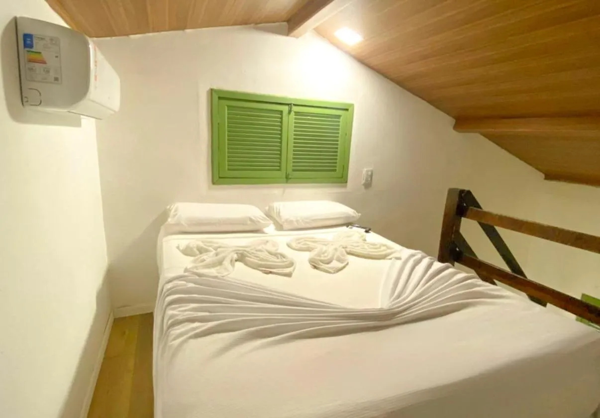 Bed in Pousada Maracaju