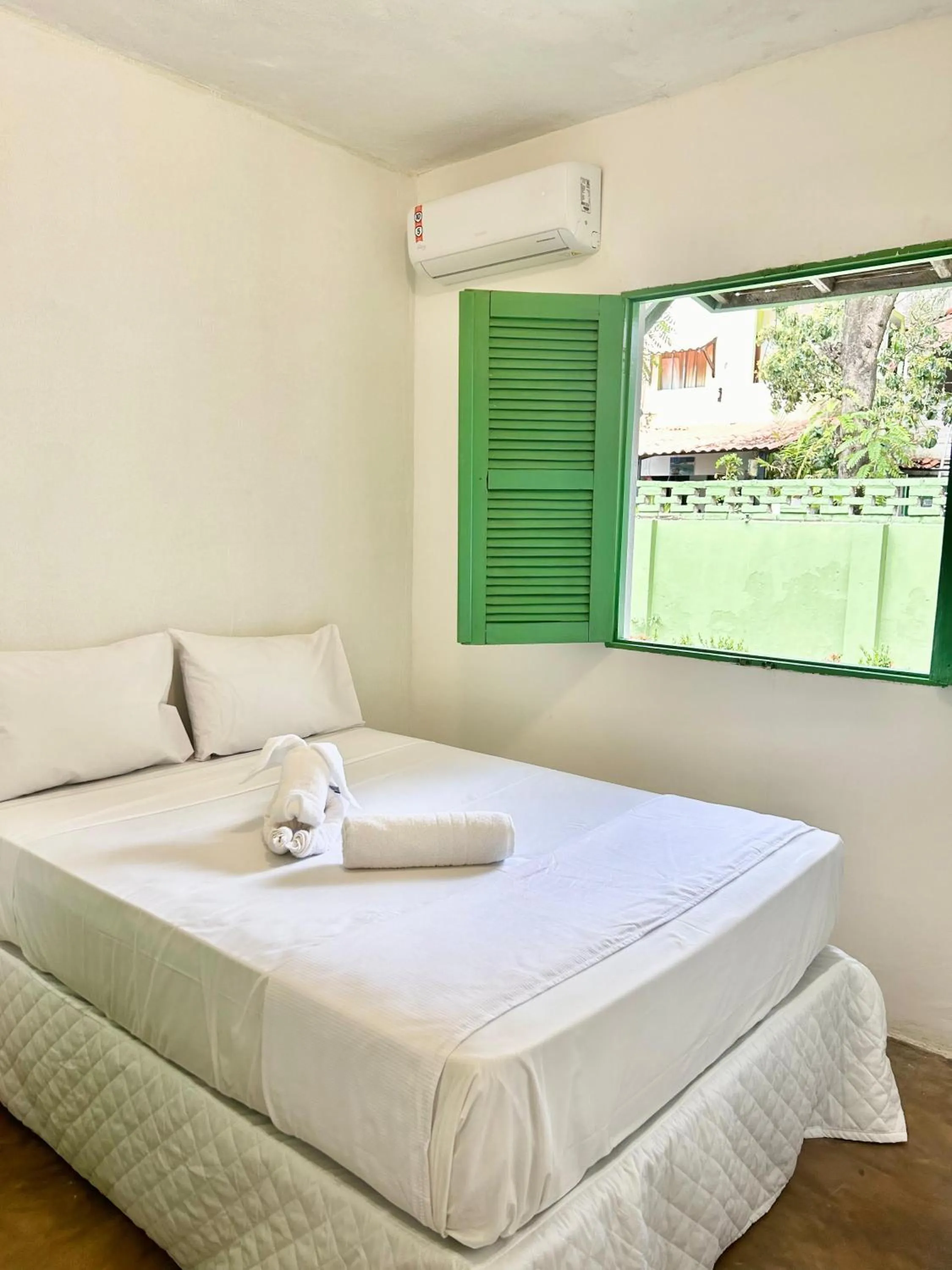 Bed in Pousada Maracaju