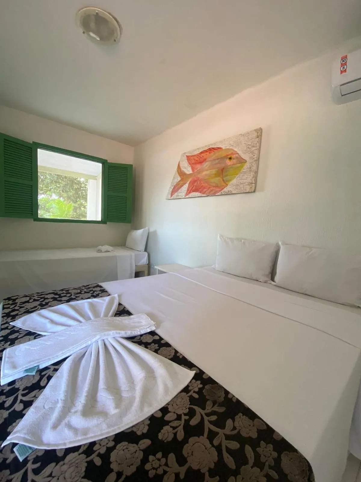 Bed in Pousada Maracaju