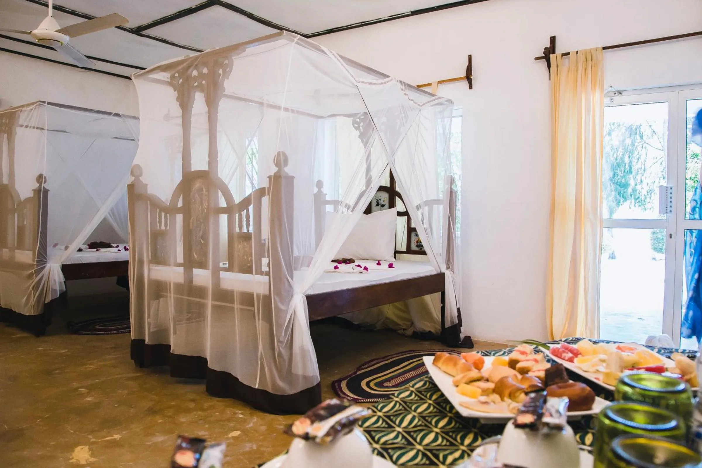 Bed in Moonshine Uroa Boutique Hotel