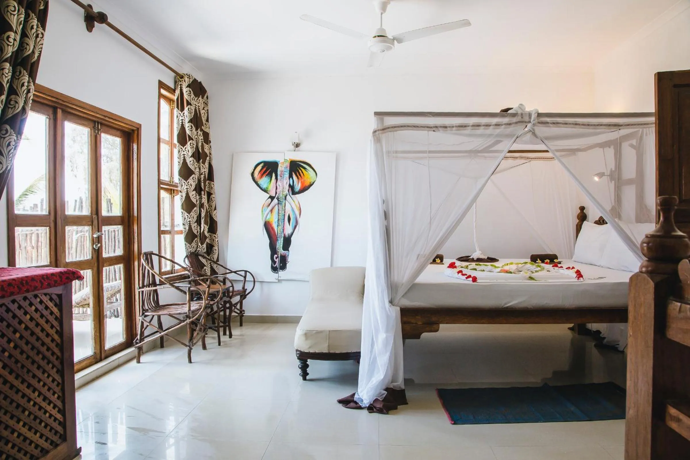 Bed in Moonshine Uroa Boutique Hotel