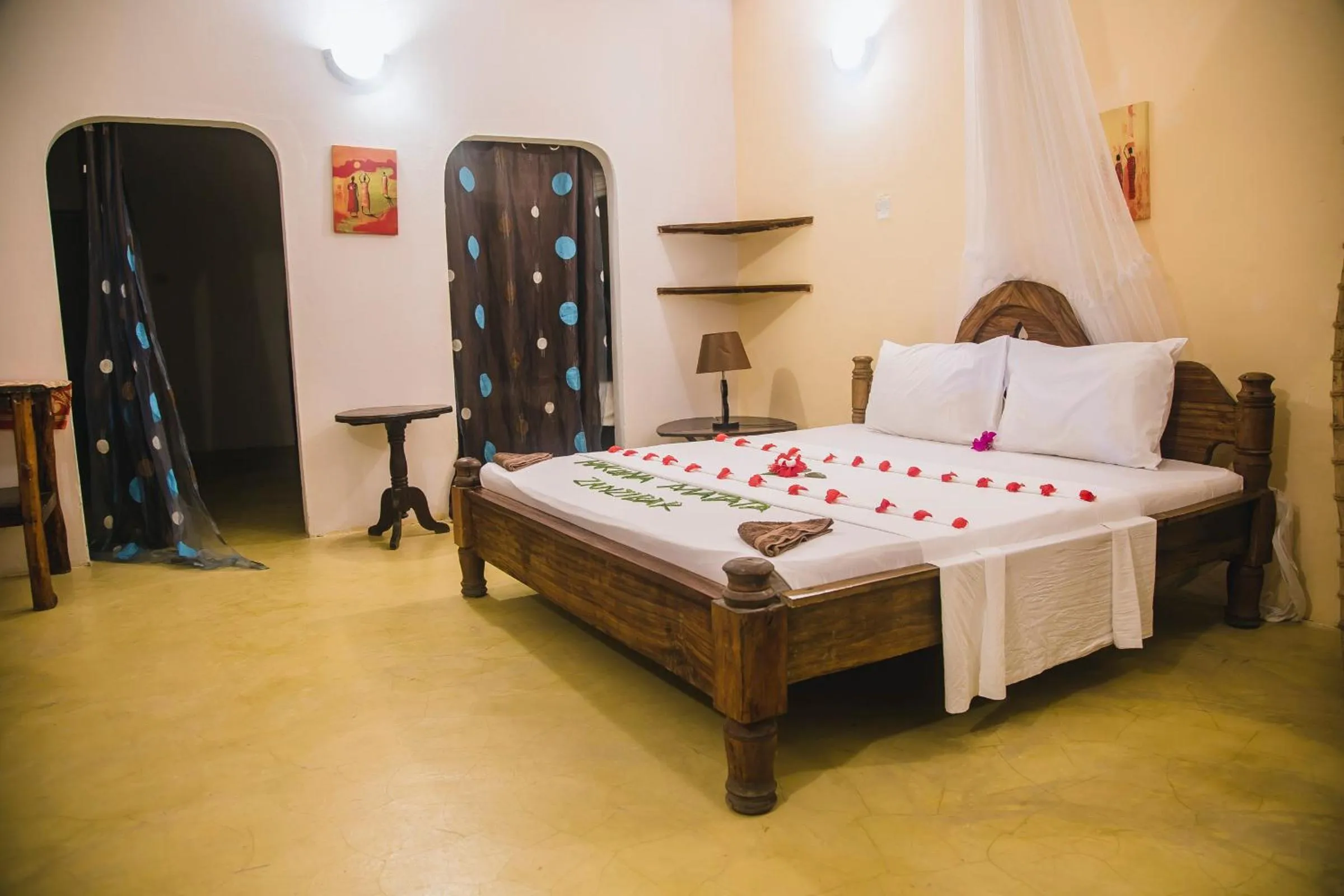 Bed in Moonshine Uroa Boutique Hotel