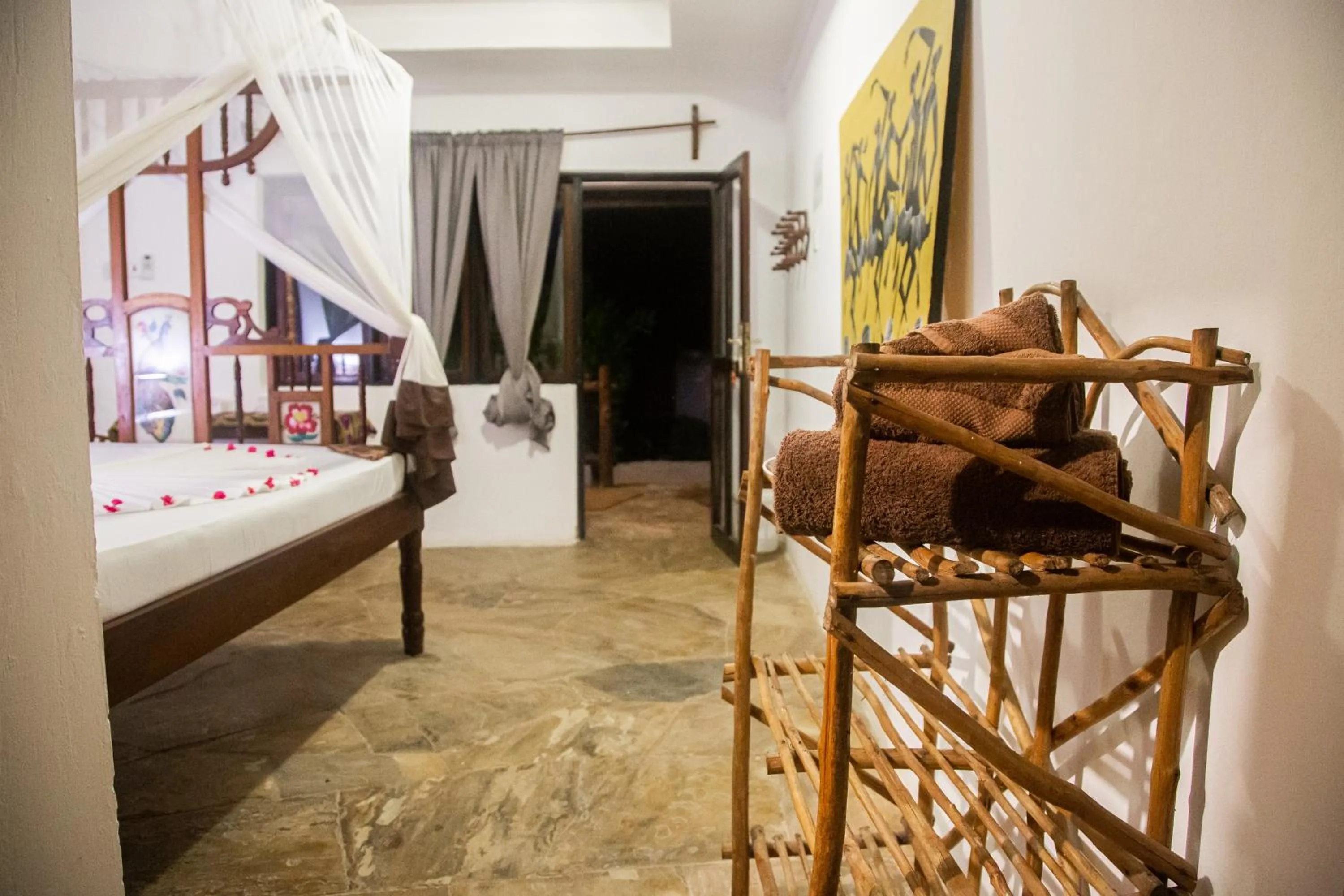 Bed in Moonshine Uroa Boutique Hotel