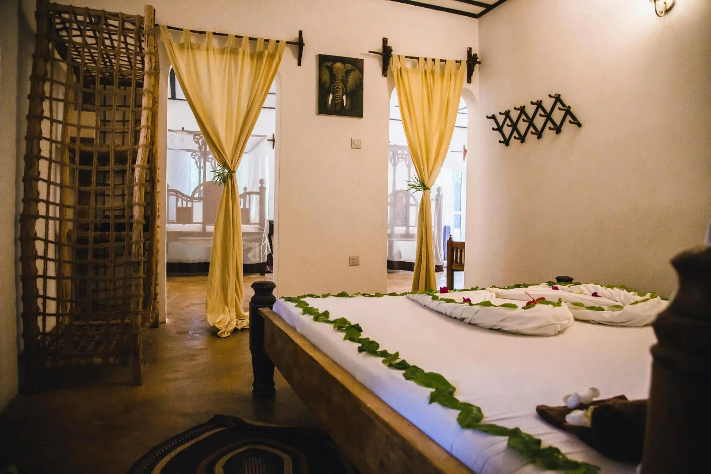 Bed in Moonshine Uroa Boutique Hotel