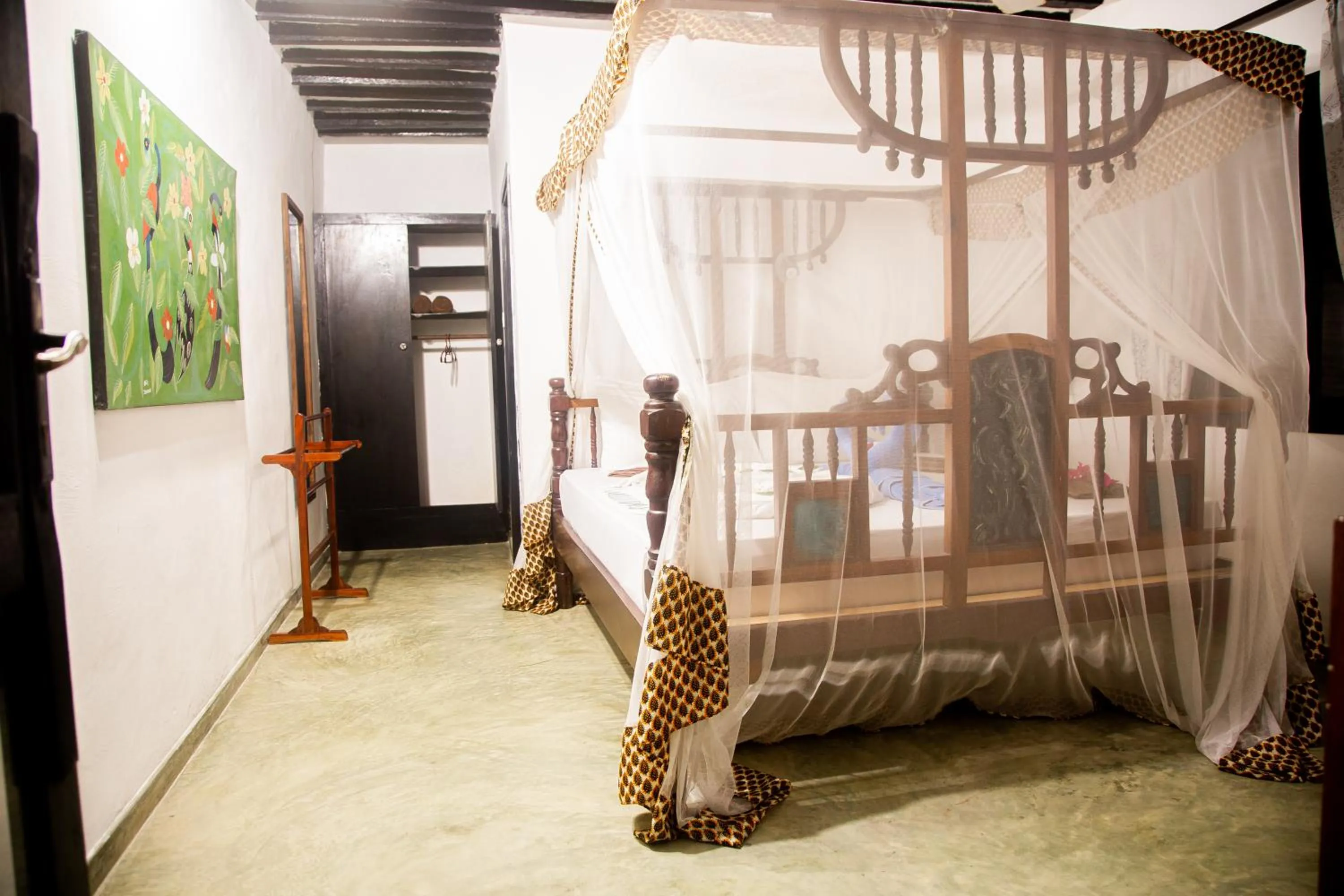 Bed in Moonshine Uroa Boutique Hotel