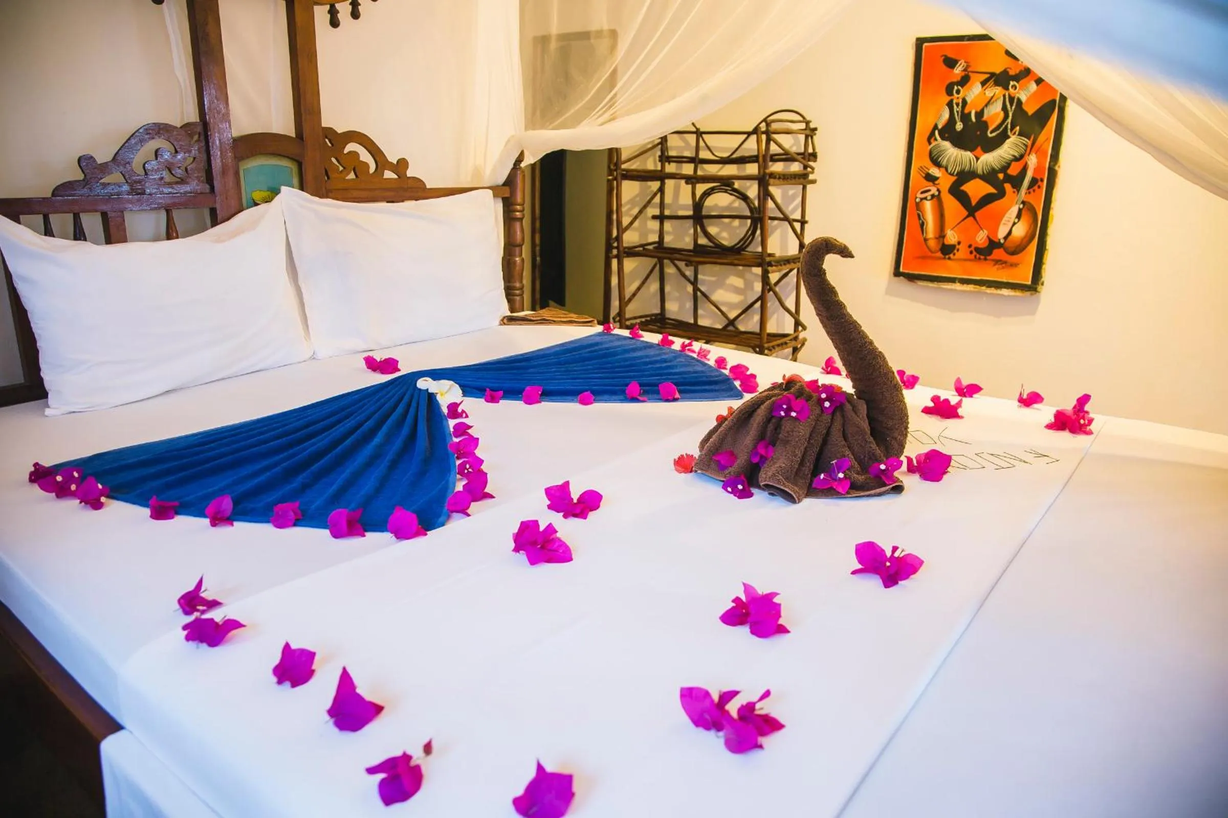 Bed in Moonshine Uroa Boutique Hotel