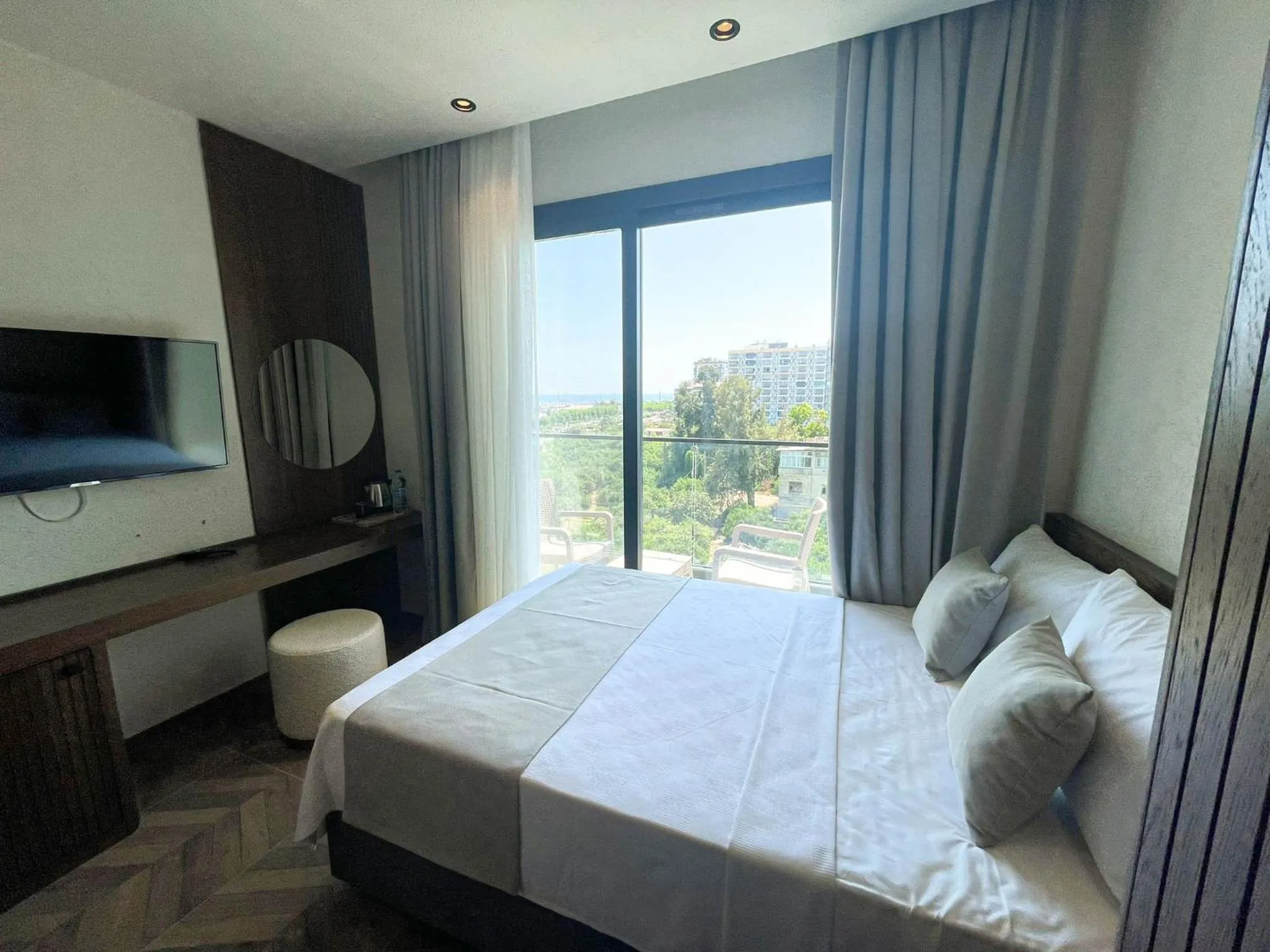 Bed in Now Boutique Hotel