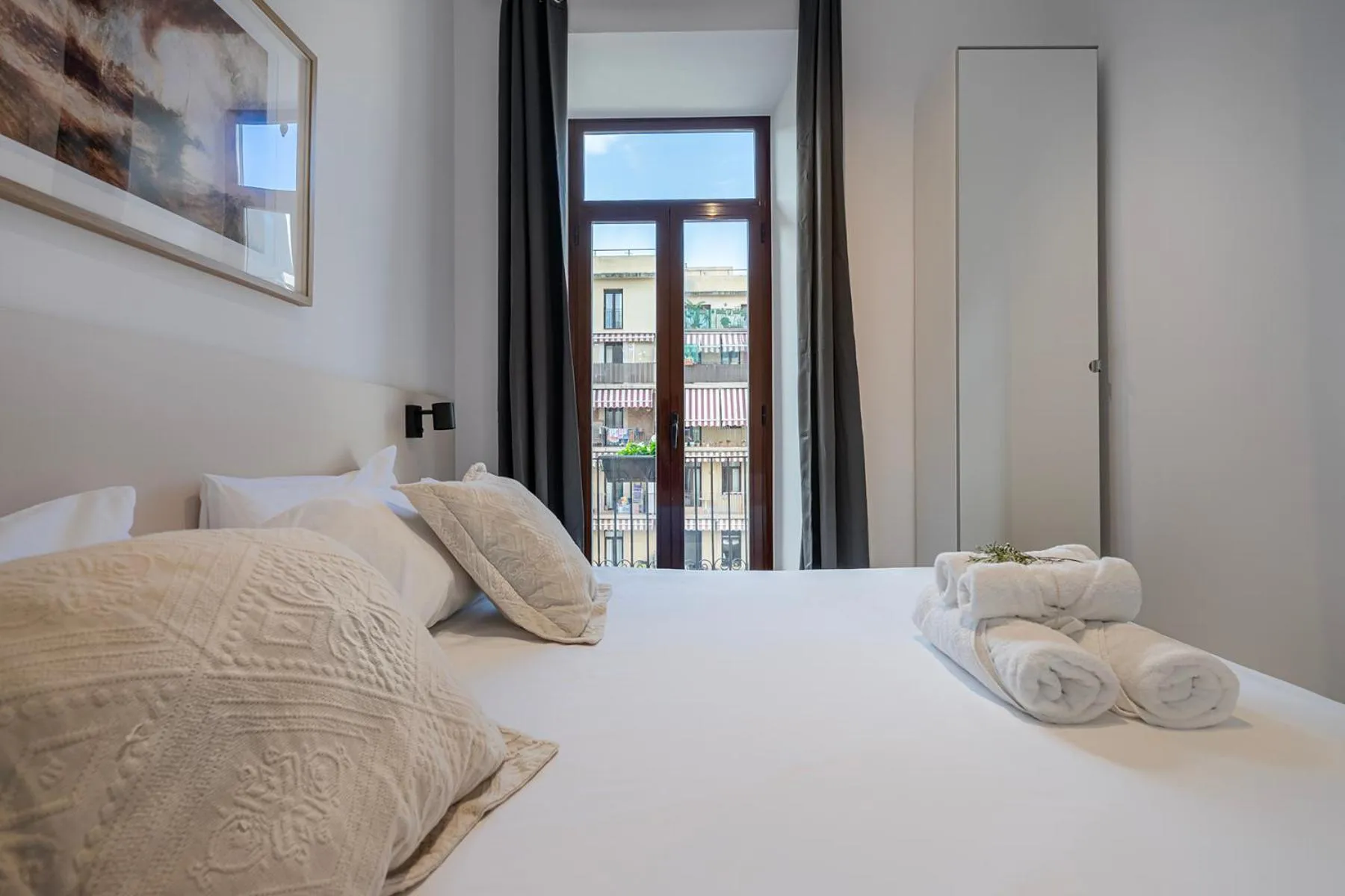 Bed in Happy Apartments