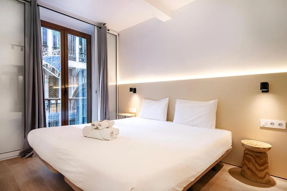 Bed in Happy Apartments