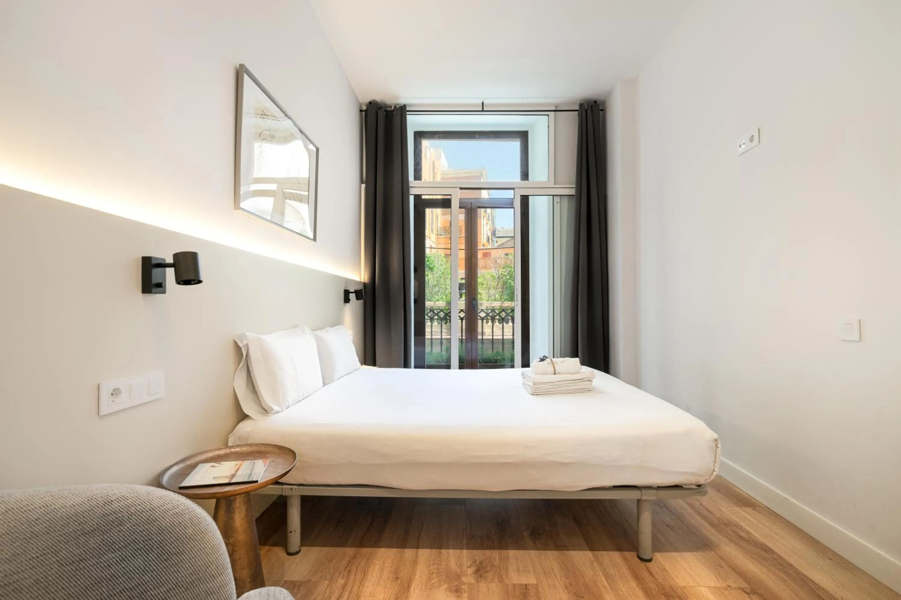 Bed in Happy Apartments