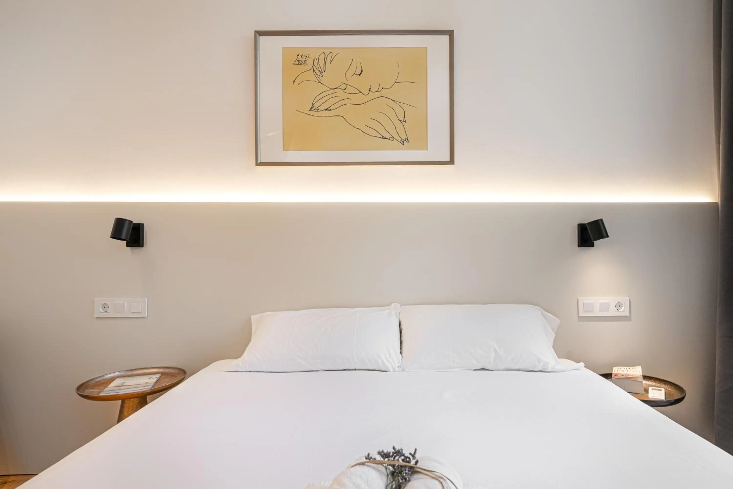 Bed in Happy Apartments