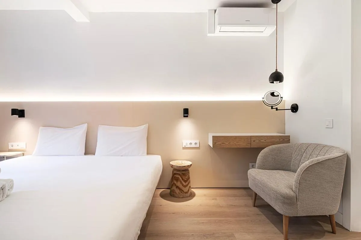 Bed in Happy Apartments