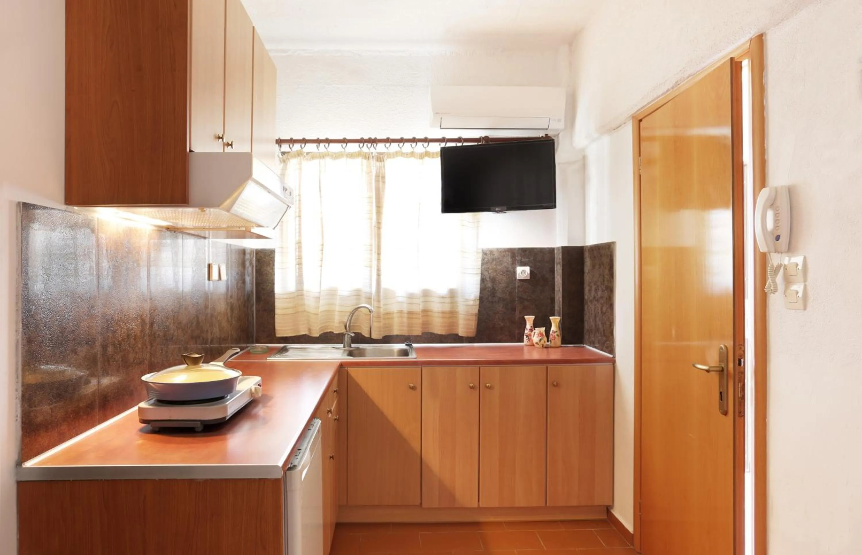 Kitchen or kitchenette in Monemvasia Green Apartments