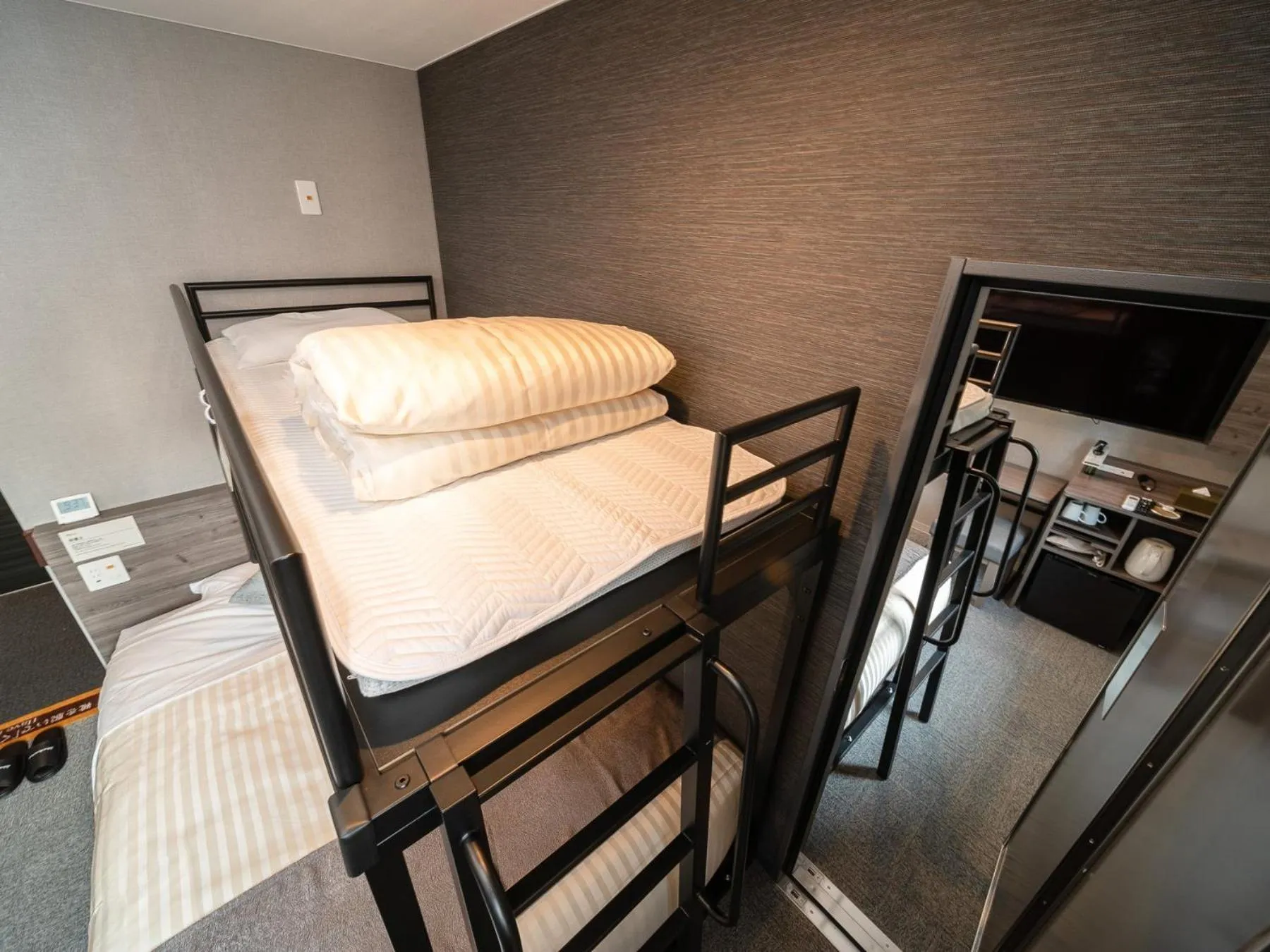 Bed in Super Hotel Premier Nagoya Sakuradoriguchi