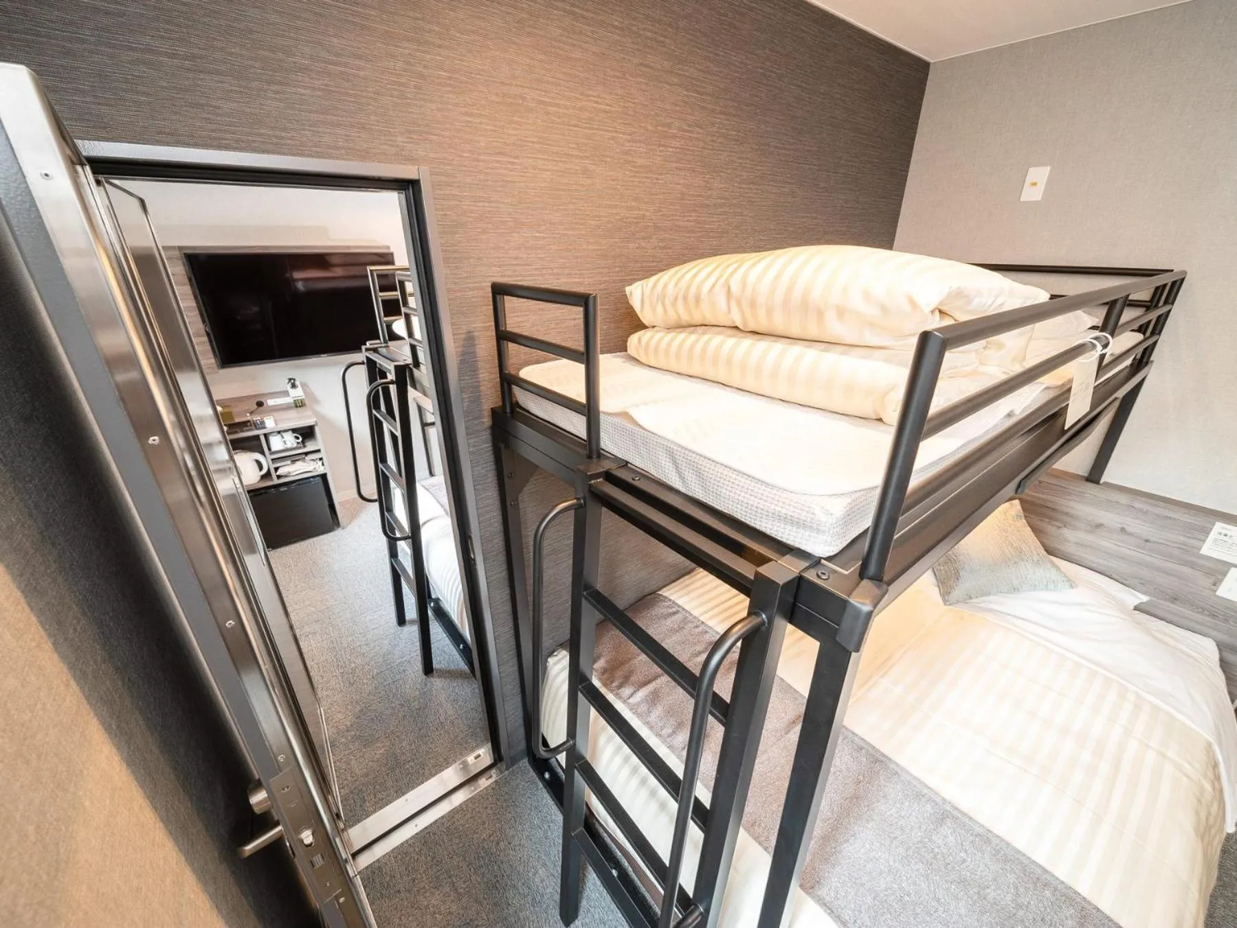 Bed in Super Hotel Premier Nagoya Sakuradoriguchi