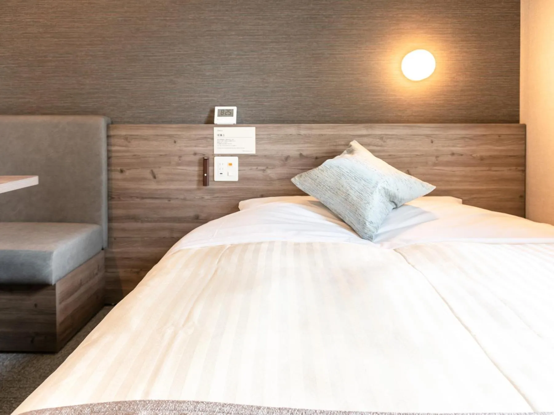 Bed in Super Hotel Premier Nagoya Sakuradoriguchi