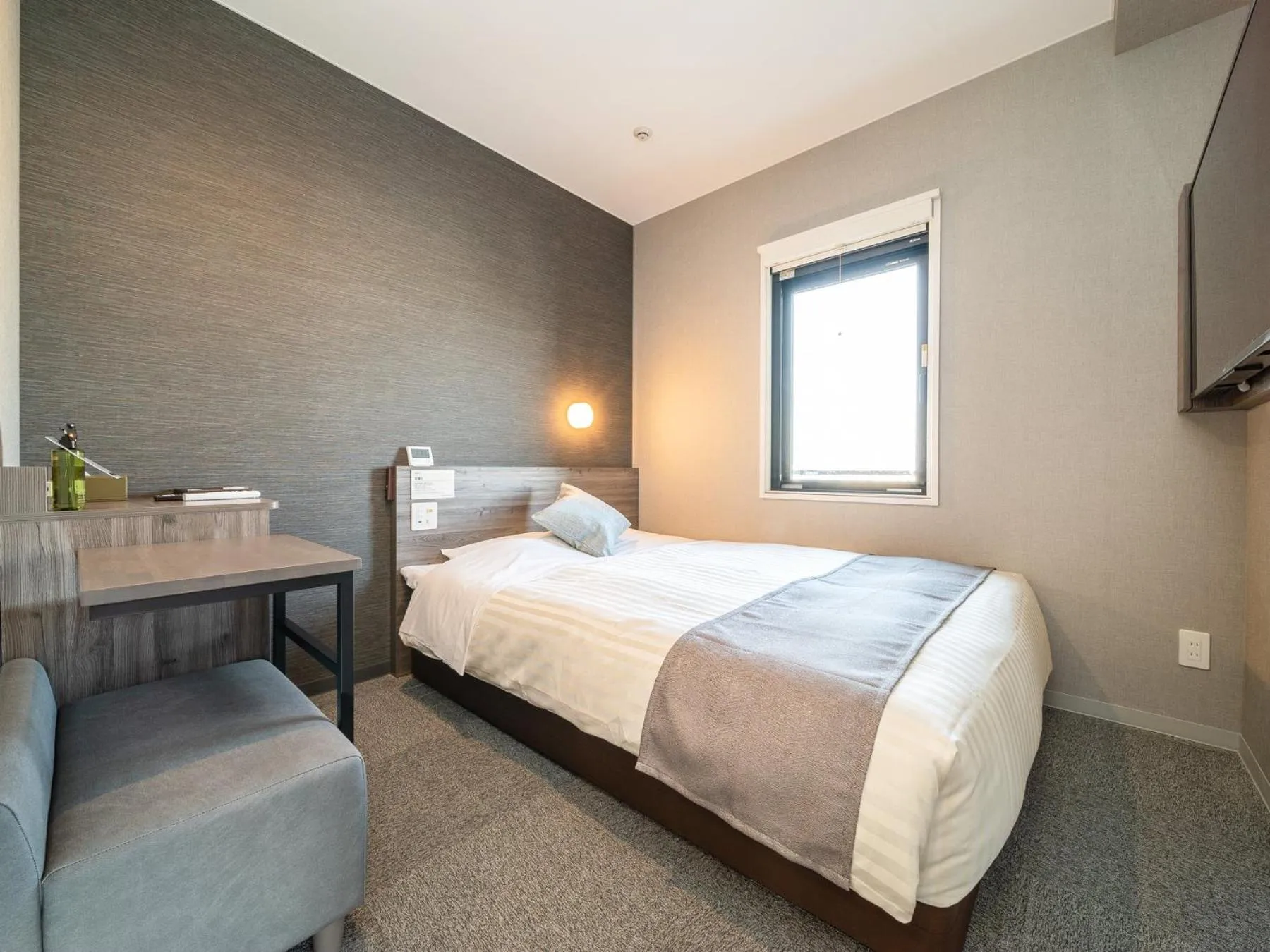 Bed in Super Hotel Premier Nagoya Sakuradoriguchi