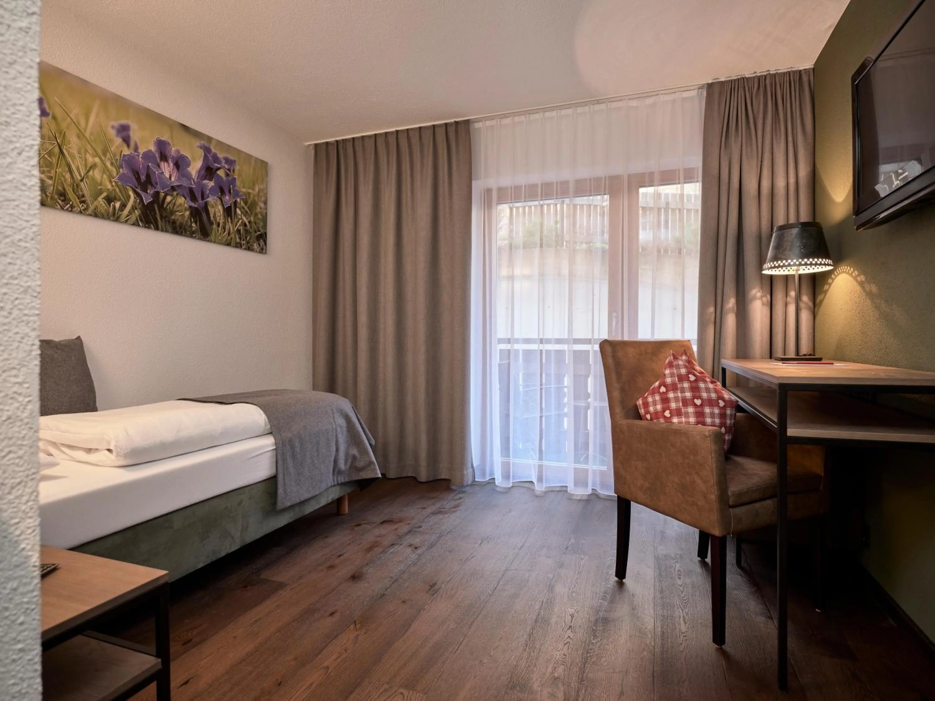 Photo of the whole room, Bed in Panoramahotel Fliesserhof