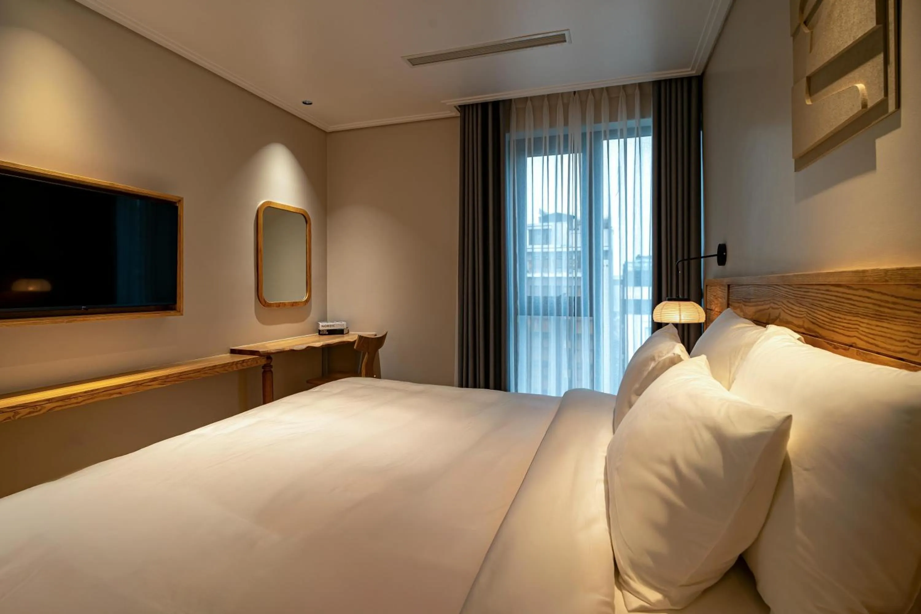 Bed in Nam Dat Hotel by D'Lecia Ha Long