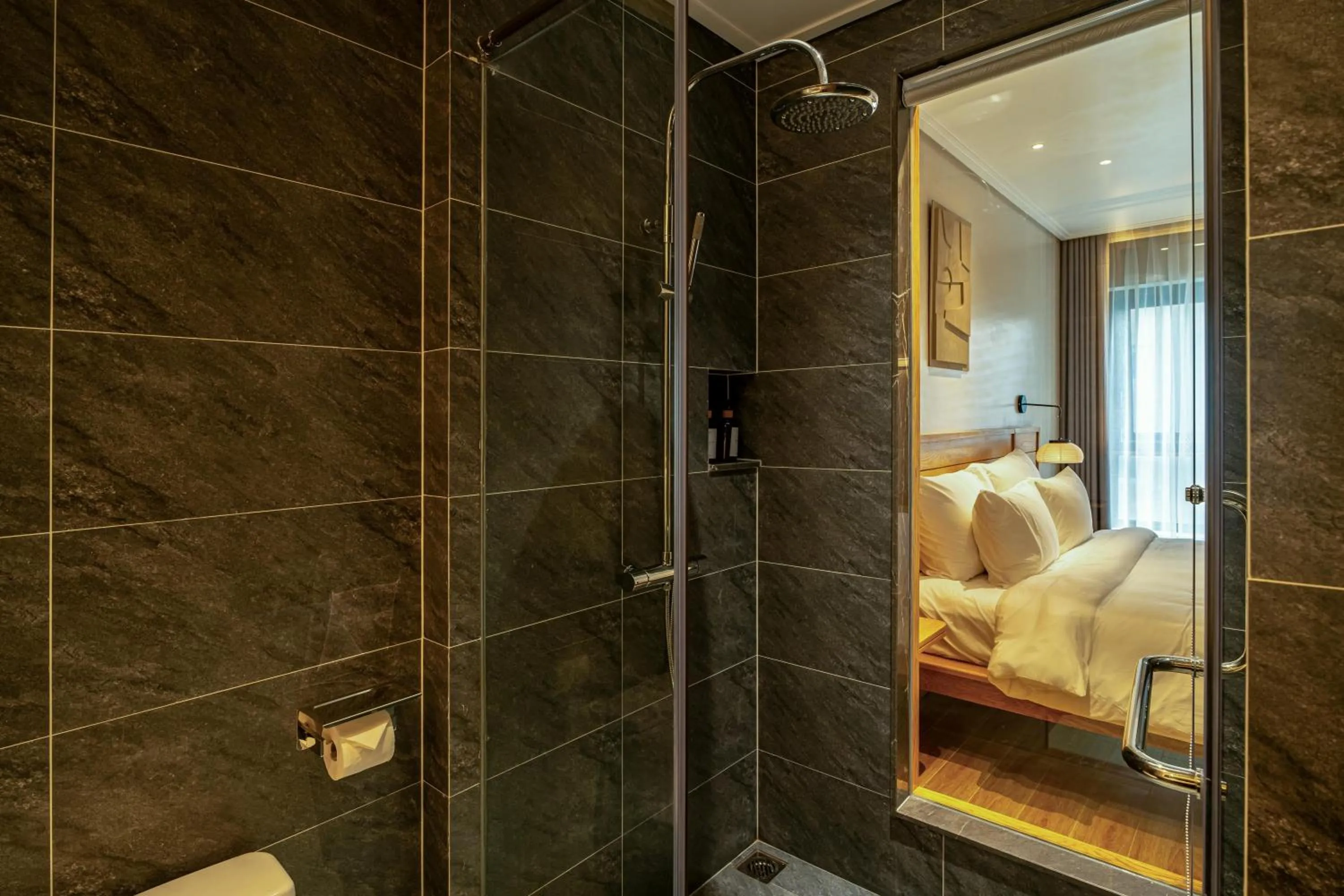 Shower, Bed in Nam Dat Hotel by D'Lecia Ha Long