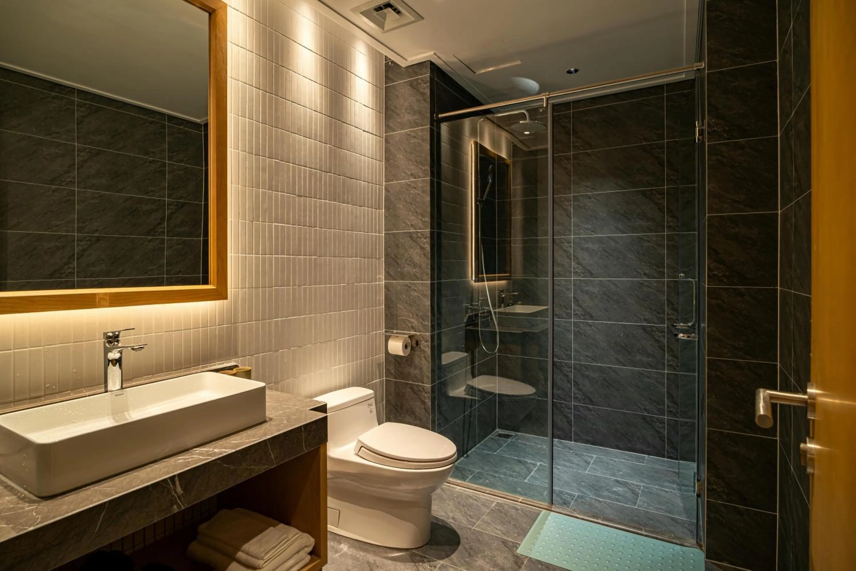 Shower in Nam Dat Hotel by D'Lecia Ha Long