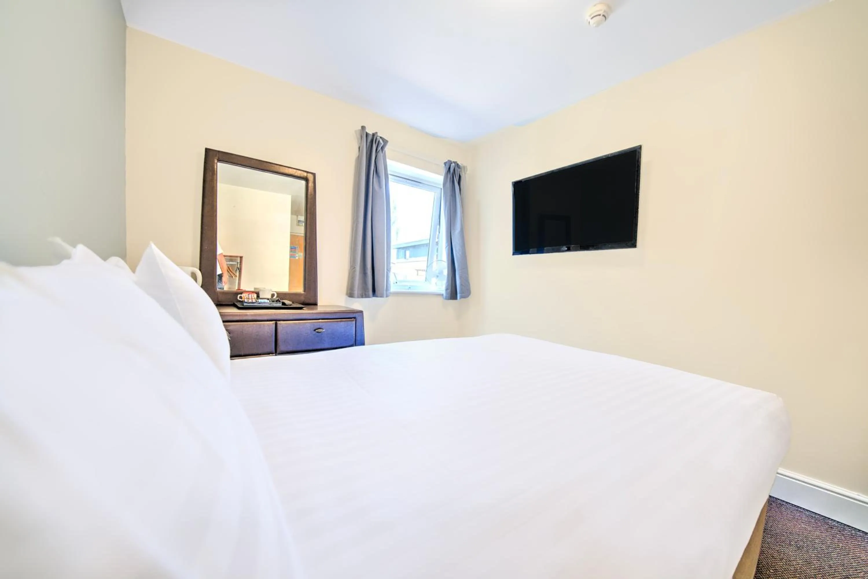 Bedroom, Bed in GO2 Gloucester Hotel by OYO