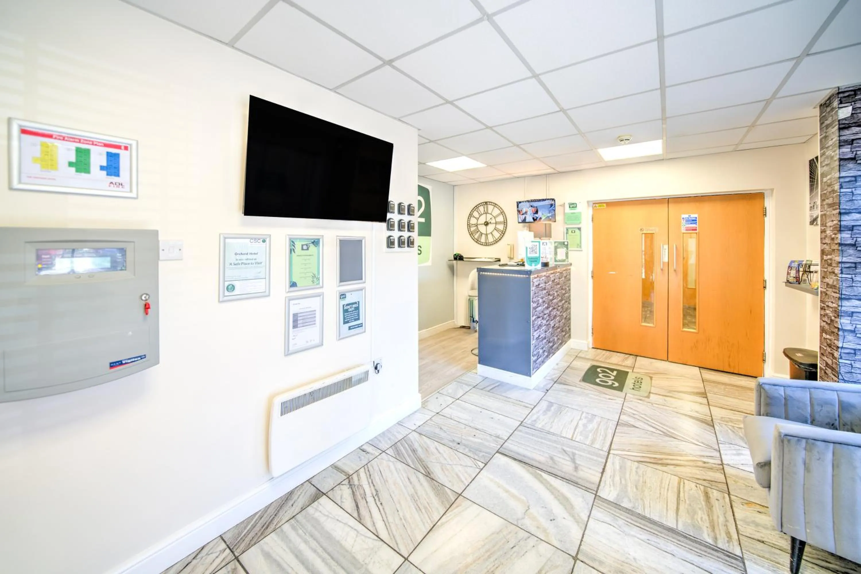 Lobby or reception in GO2 Gloucester Hotel by OYO