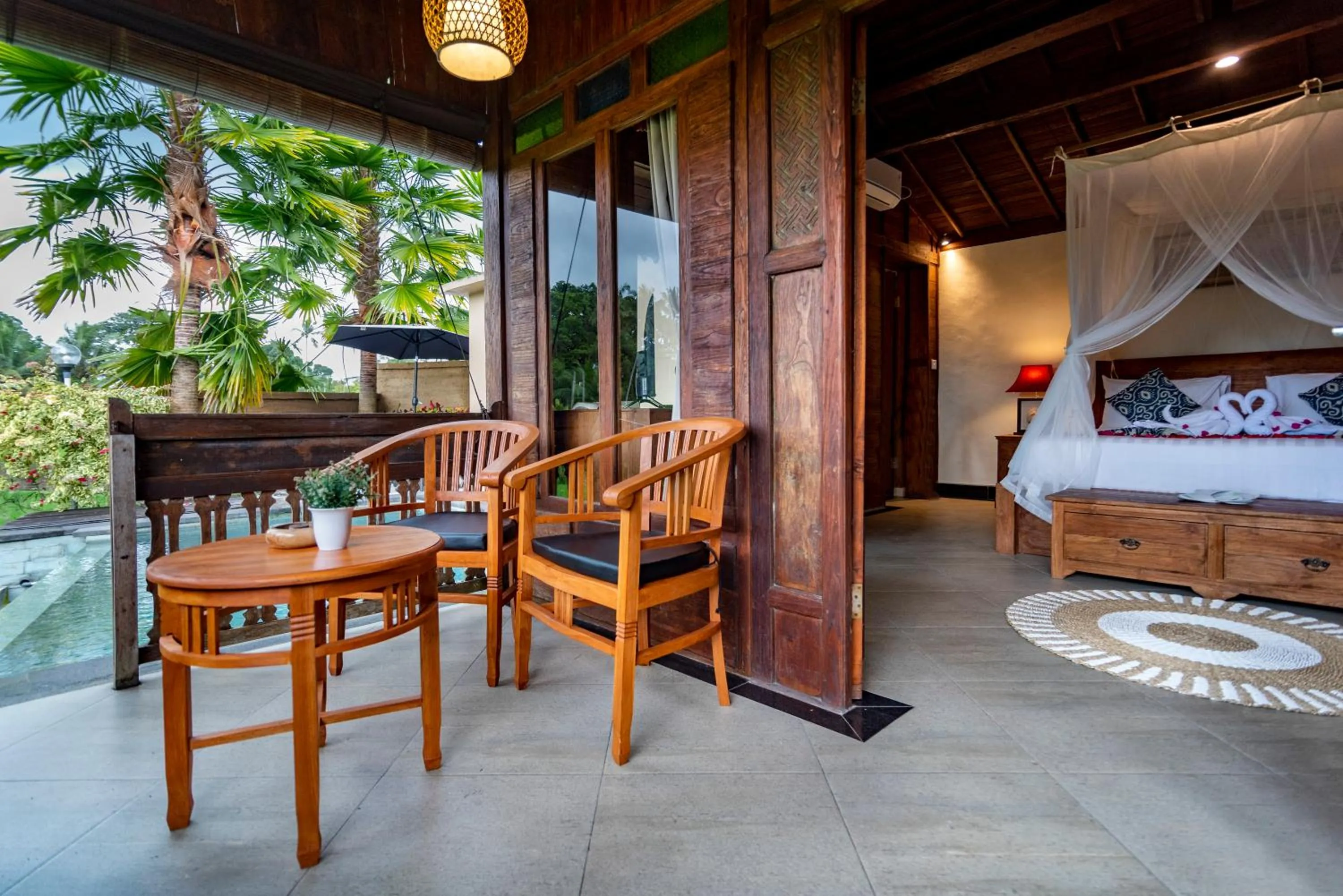 Balcony/Terrace in Taksu Villa Ubud Sebatu by Dhananjaya Hospitality